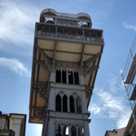 The Elevador de Santa Justa is a vertical elevator located in Lisbon, Portugal, which connects the Baixa (historic center) with the Alto neighborhood of the city. It was built in 1902 by Portuguese engineer Raoul Mesnier du Ponsard, a disciple of Gustave Eiffel, and is one of Lisbon